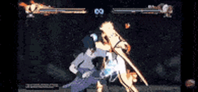 a video game is being played on a screen with two characters fighting each other .