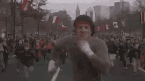 a blurred image of a crowd of people with the word keep written above them