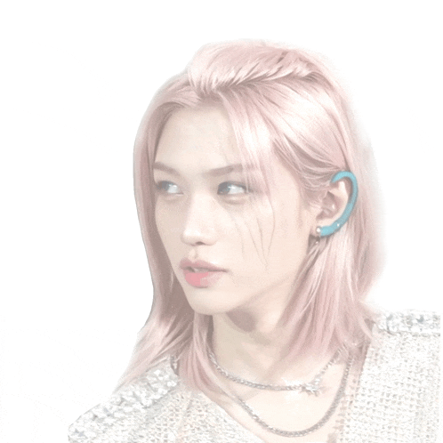a woman with pink hair has a blue earring on her left ear