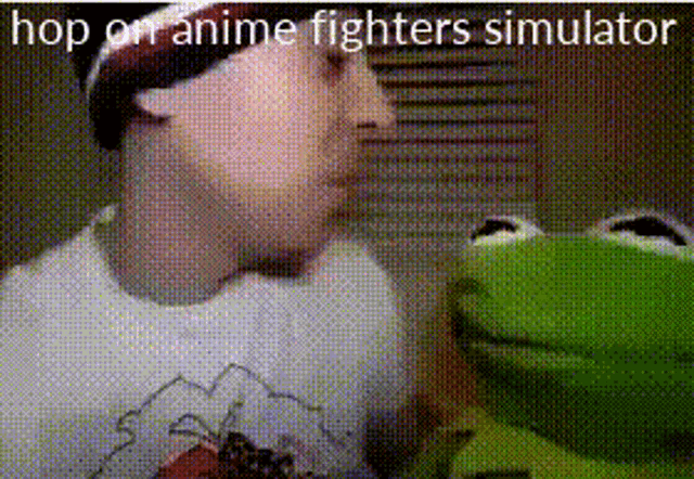 a man and a frog are standing next to each other and talking to each other .