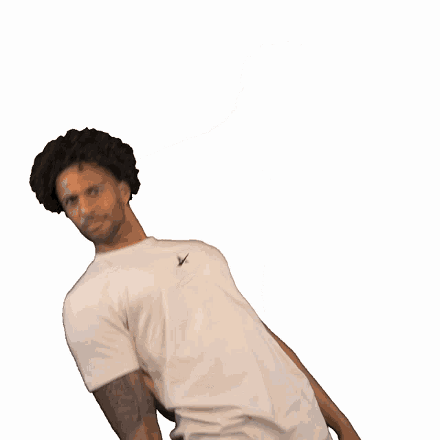 a man wearing a white t-shirt with a black letter a on it