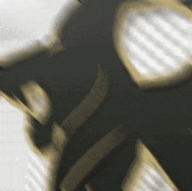 a blurry picture of a gas mask on a person 's head