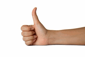 a person is holding a hammer in their hand