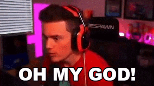 a man wearing headphones and a red shirt says oh my god .