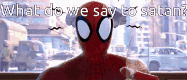 a spider man sitting in front of a window with the words " what do we say to satan "