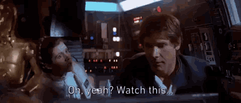 a man and a woman are standing next to each other and the man says oh yeah watch this