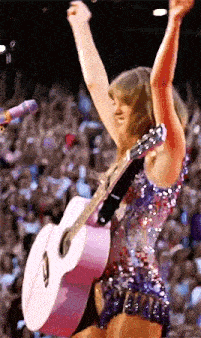 a woman in a sequined dress is holding a pink guitar in her hands