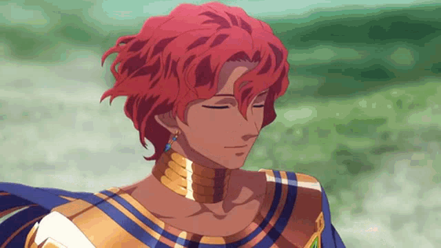 a man with red hair wearing a gold necklace