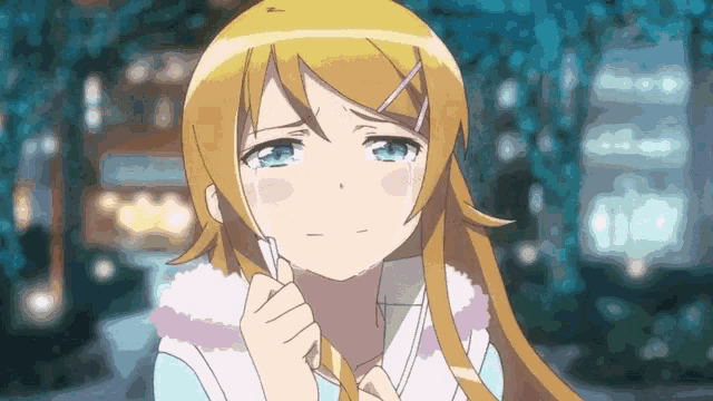 a girl with long blonde hair is crying and holding a piece of paper