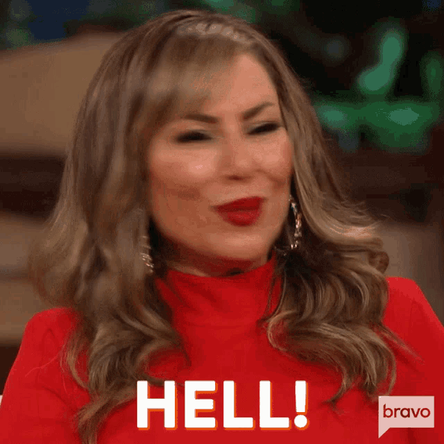 a woman in a red top says " hell "