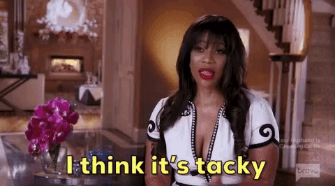 a woman is sitting in a living room and saying `` i think it 's tacky ''