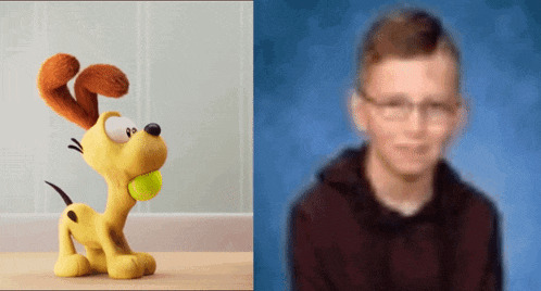 a stuffed dog next to a blurry picture of a boy