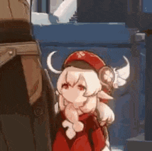 a girl with horns and wings is standing next to a man in a red jacket .