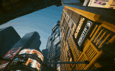 looking up at a building with a sign that says rokota on it