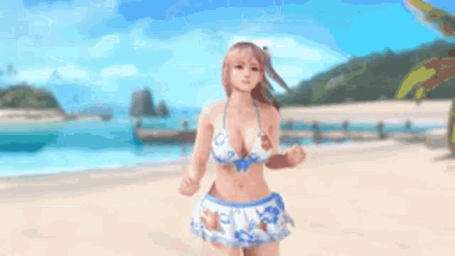 a woman in a bikini is standing on the beach .