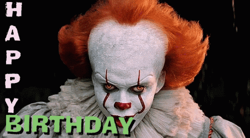 a creepy clown with red hair and the words happy birthday behind him