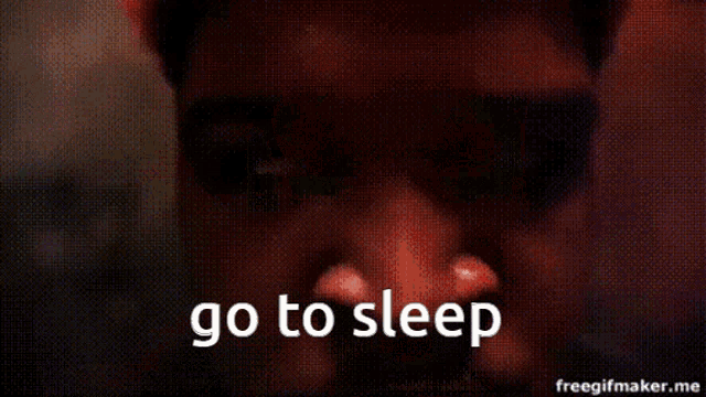 a man giving the middle finger with the words go to sleep written below him
