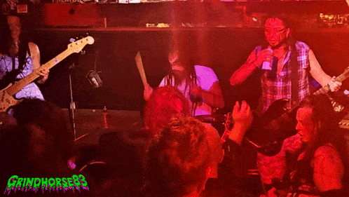 a group of people are playing guitars in front of a marshall amp