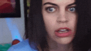 a woman with a surprised look on her face