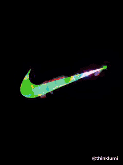 the nike logo is glowing in the dark and has a rainbow of colors