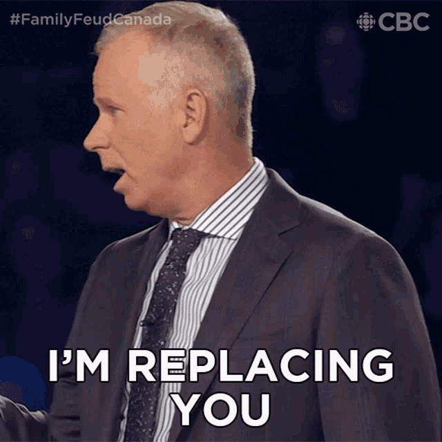 a man in a suit and tie is saying " i 'm replacing you "