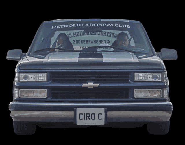 a black chevrolet with a license plate that reads ciro c
