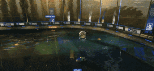 a rocket league game is being played and a yellow car is flying in the air