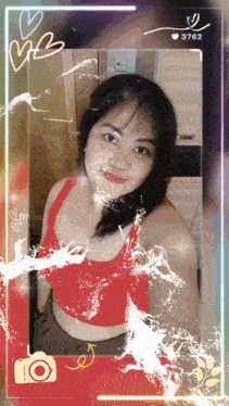 a woman in a red tank top is in a frame with the number 3762 at the top