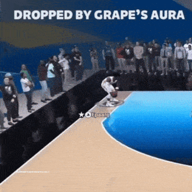 a man is doing a trick on a skateboard in front of a crowd with the words dropped by grape 's aura
