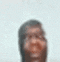 a blurry picture of a man 's face with a beard .
