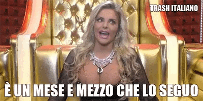 a woman sitting in a chair with the words trash italiano written on the bottom