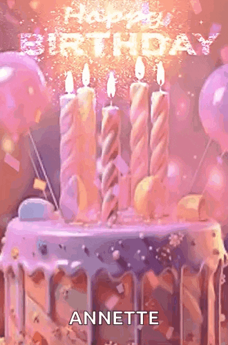 a birthday cake with candles and the name annette written on it