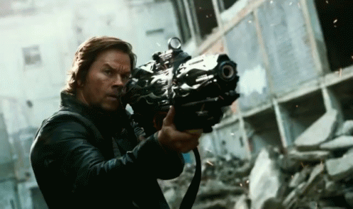 Shooting A Gun GIF - Mark Wahlberg Shoot Transformers GIFs