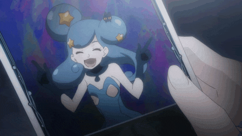a person taking a picture of a girl with blue hair