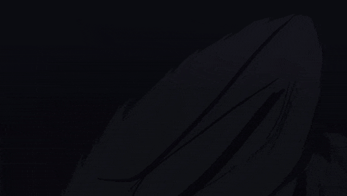 a black wolf with red eyes is looking up at something