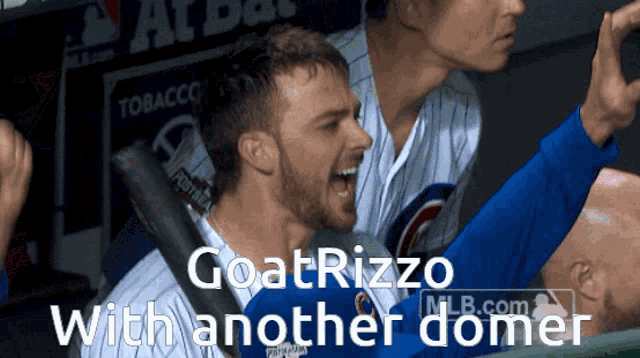 a baseball player with the name goatrizzo with another domer next to him