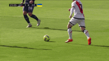 a soccer player with the number 9 on his shirt