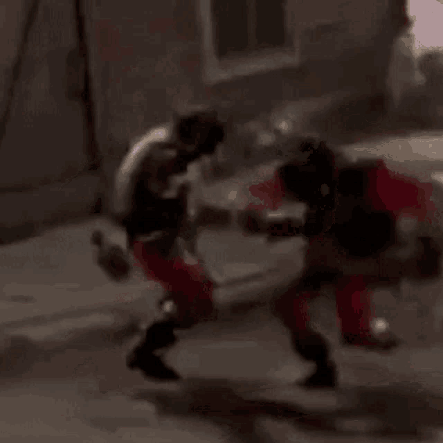 a blurry picture of a man in a santa suit walking down a street