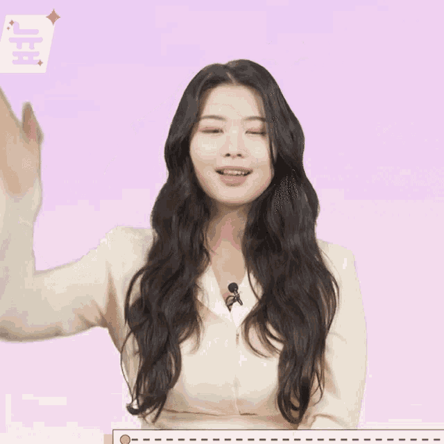 a woman with long hair has a speech bubble with a heart and the number 1 above her head