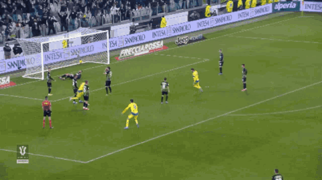 a soccer player wearing a jeep jersey celebrates a goal