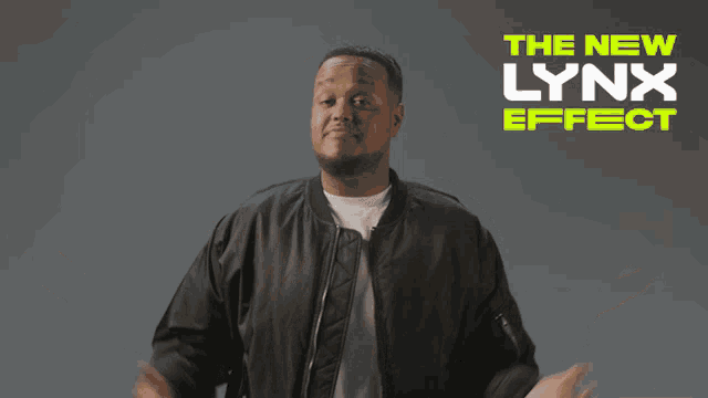 a man in a black jacket is standing in front of a poster that says the new lynx effect