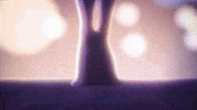 a purple background with a blurred image of a tree