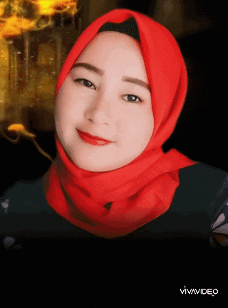 a woman wearing a red hijab is smiling in a vivavideo video
