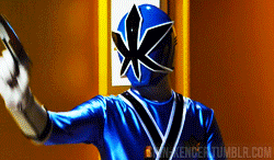 a blue power ranger is holding a gun in front of a tumblr.com link