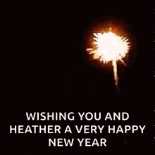 a greeting card with fireworks and the words `` wishing you and heather a very happy new year ''