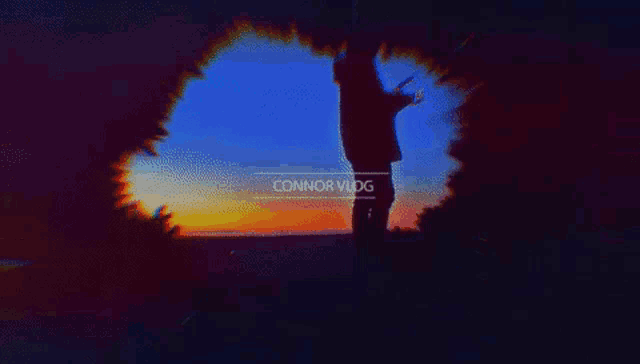 a silhouette of a person standing in front of a sunset with connor vlog written on the bottom