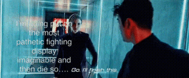 a man is standing in front of a mirror and talking to another man .