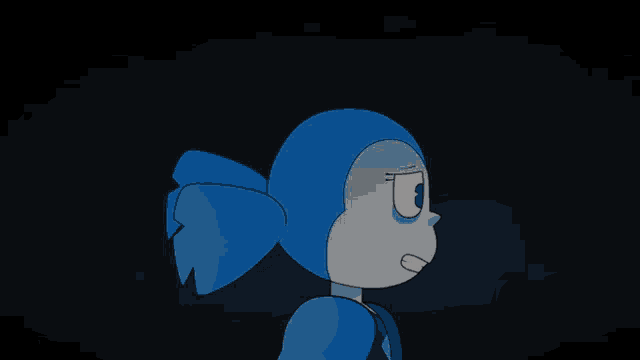 a blue cartoon character standing in the dark