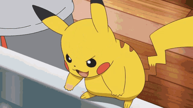 a cartoon pikachu is standing on a ledge