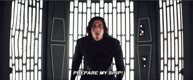 a man standing in front of a wall with the words prepare my ship